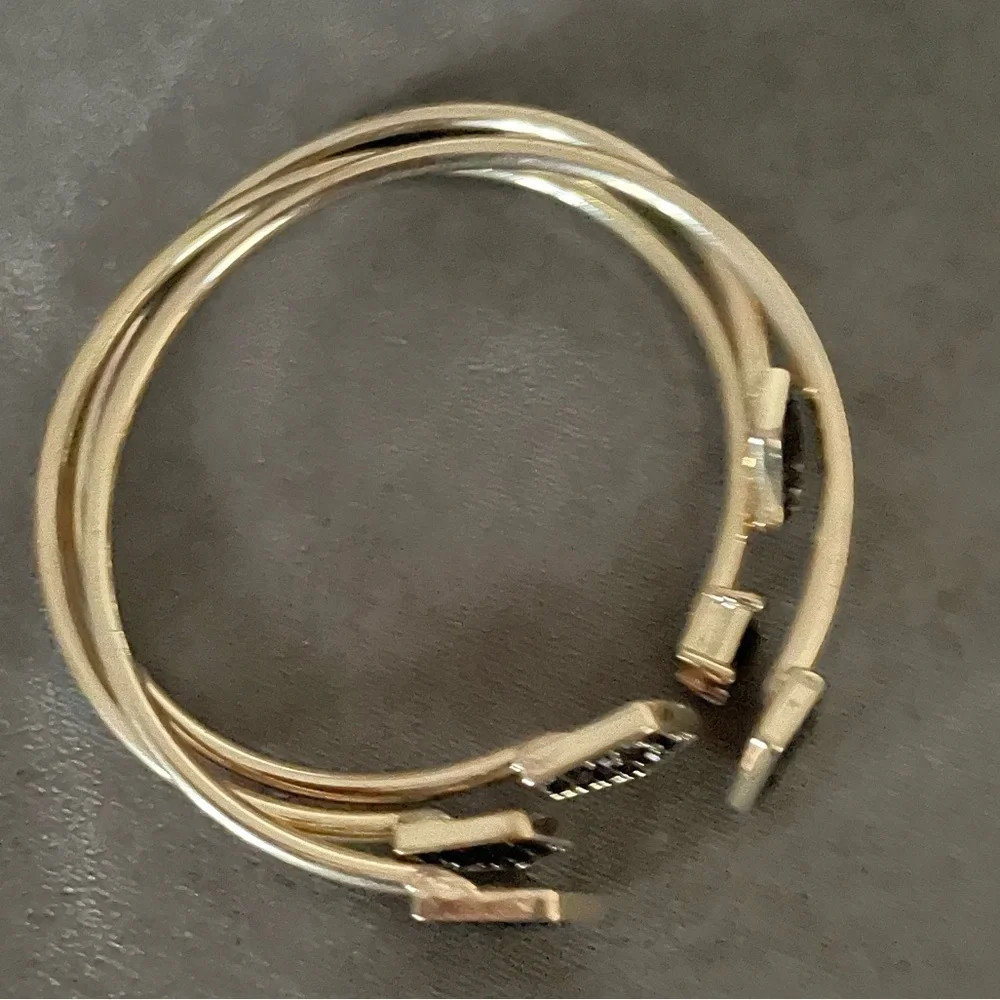 Set of 3 gold and black bangle bracelets